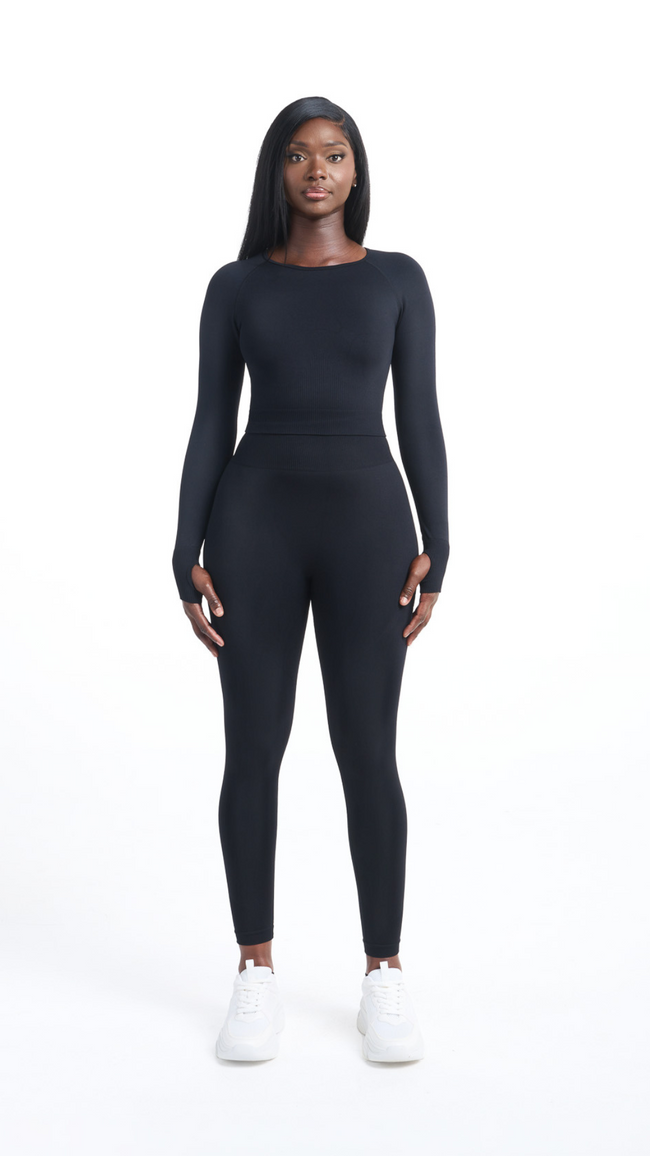 Full view of Woman wearing a Black Shavo Long Sleeved Top with matching Shavo legging