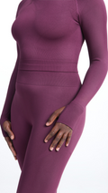Close front view of purple Shavo Long Sleeve Top. Matching purple Shavo seamless legging pictured.