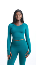 Front view of Turquoise Shavo Long Sleeve Top. Matching Turquoise Shavo seamless legging pictured.
