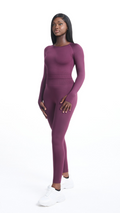 Full angled view of woman wearing a purple Shavo Long Sleeved Top with matching Shavo legging
