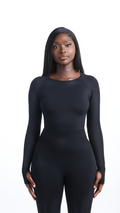 Front view of Black Shavo Long Sleeve Top. Matching black Shavo seamless legging pictured.