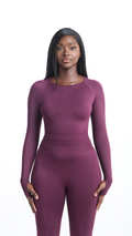 Front view of purple Shavo Long Sleeve Top. Matching seamless legging also pictured.