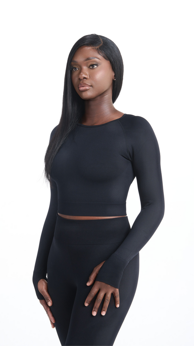 Front view of Black Shavo Long Sleeve Top. Matching black Shavo seamless legging pictured.