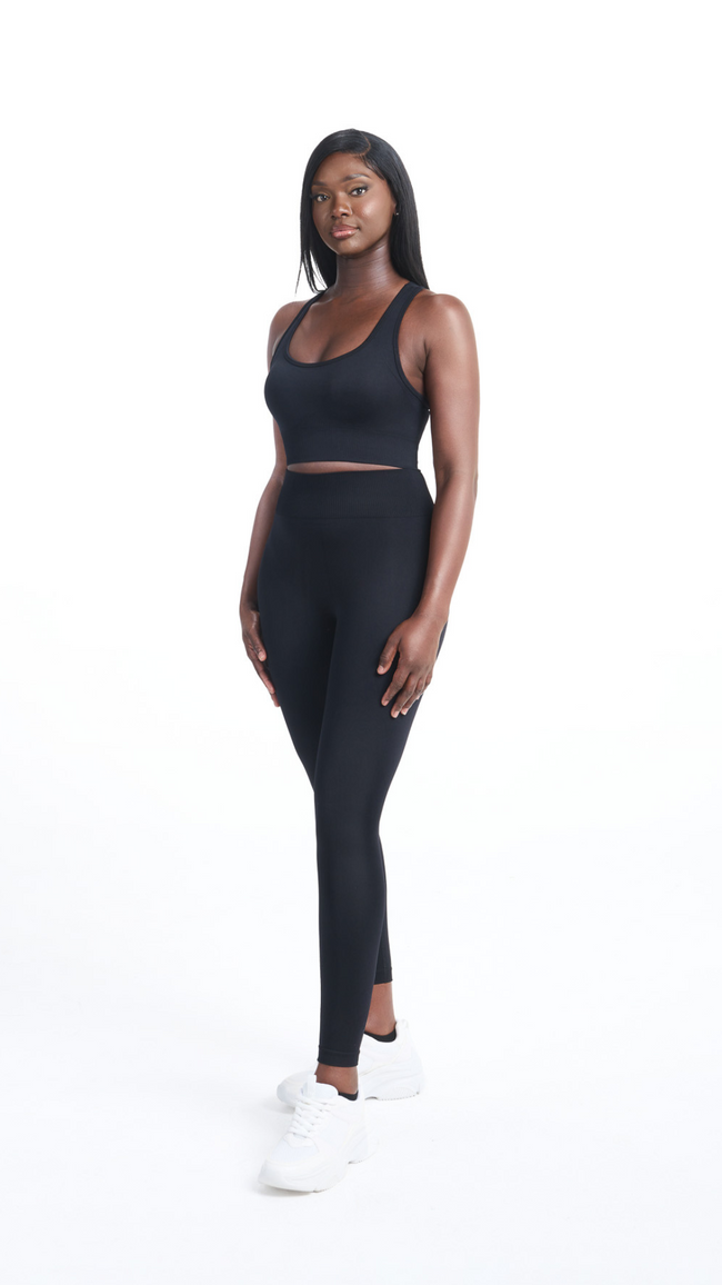 Full view of woman wearing Black Shavo Seamless bra with matching Shavo Black Legging