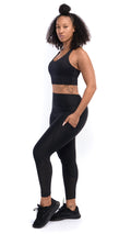 Side view of Ansa Top - Womens Black Sports Bra - Roam Loud