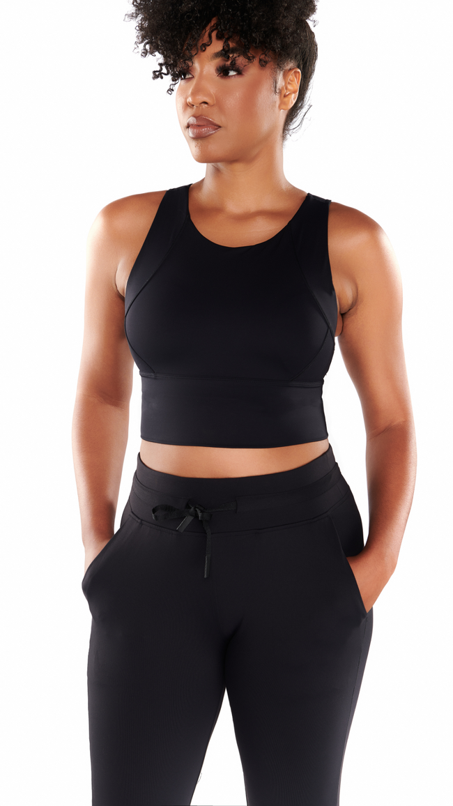 Woman wearing Black Yanta Tank Bra. High-intensity workout essential with full coverage support