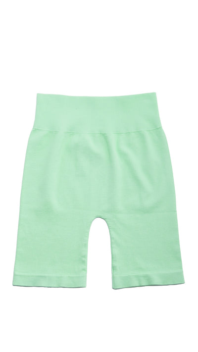 Flat lay of Bai Ribbed Biker Shorts - Lime Green - Roam Loud